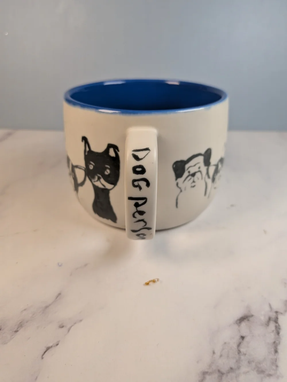 Anthropologie Cream Black Ceramic Dog Person Mug with Blue Interior
